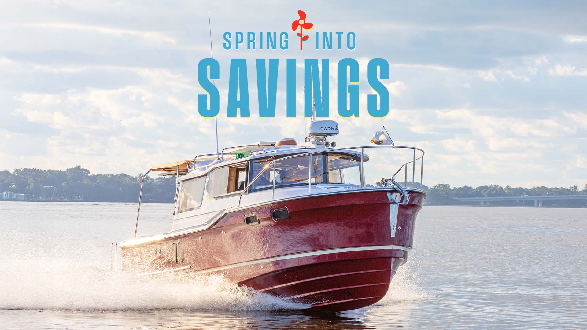 A Ranger Tugs R-27 and the Spring into Savings logo above